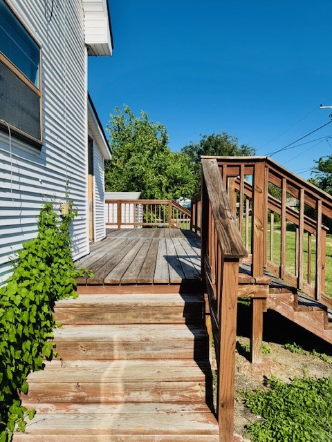 217 Main Street Palacios, TX 77465 - Photo 3 of 45 a view of house with yard and staircase