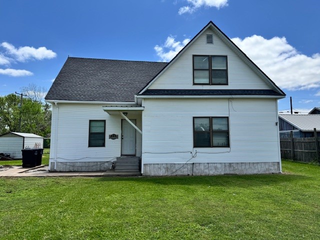 217 Main Street Palacios, TX 77465 - Photo 5 of 45 a front view of a house with garden