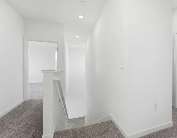 a view of hallway with stairs