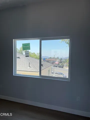 a view of a room that has a window