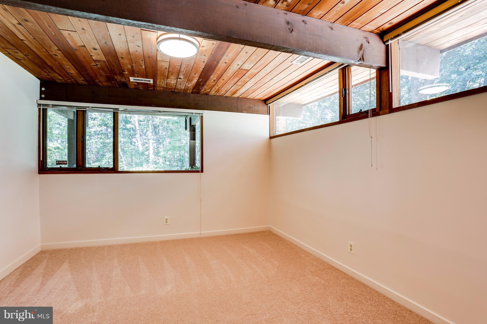 10900 Moxley Road Damascus, MD 20872 - Photo 21 of 30 a view of an empty room with a window