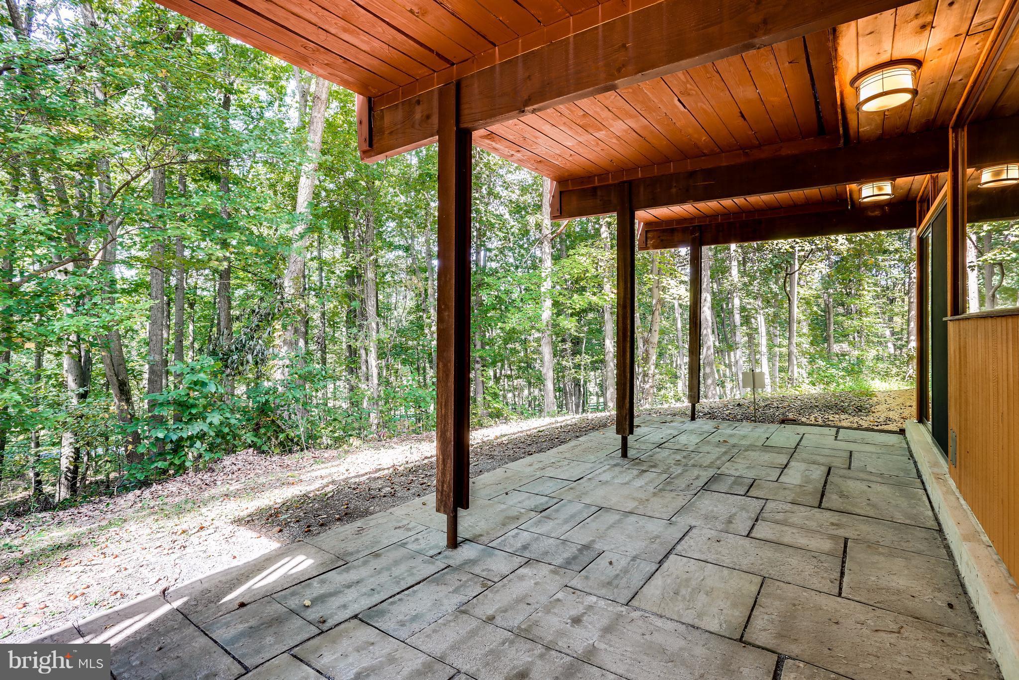 10900 Moxley Road Damascus, MD 20872 - Photo 24 of 30 a view of a porch with a backyard