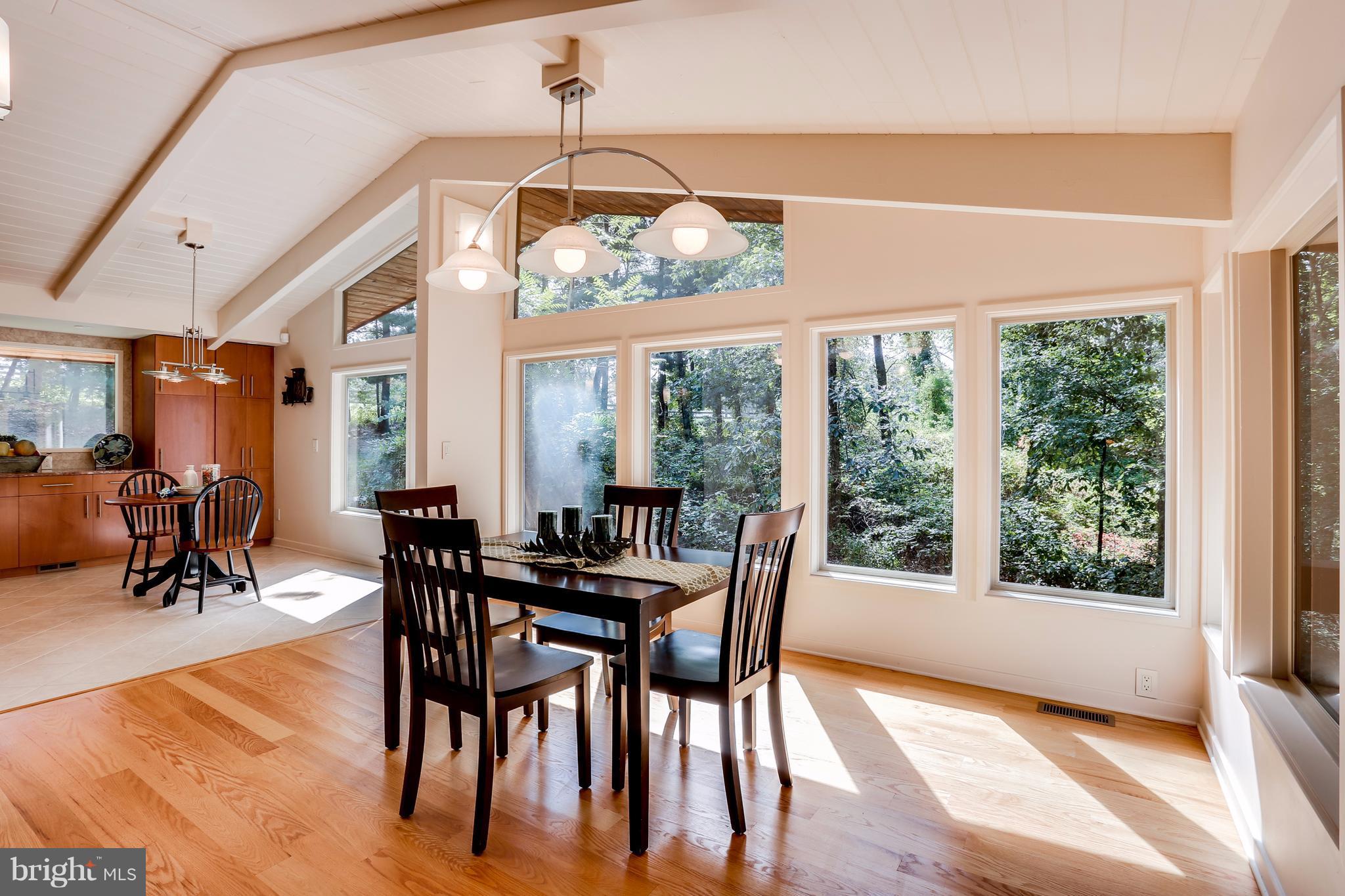 10900 Moxley Road Damascus, MD 20872 - Photo 6 of 30 a view of a dining room with furniture window and outside view
