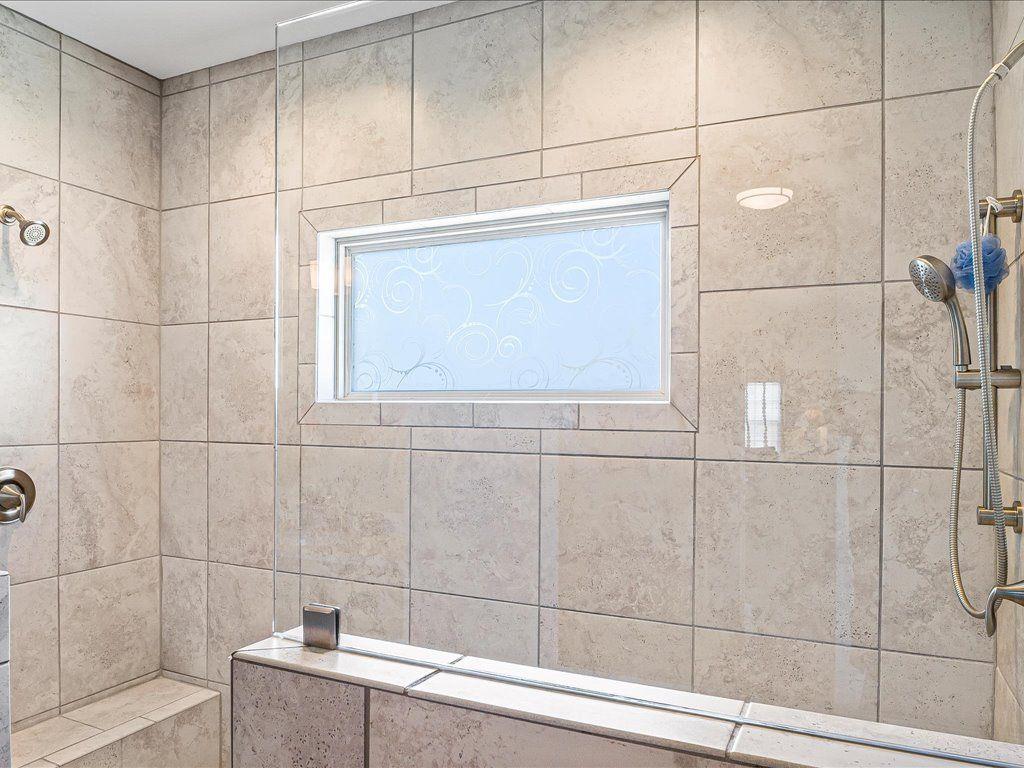 7675 Volion Drive Fairburn, GA 30213 - Photo 13 of 44 a bathroom with a shower