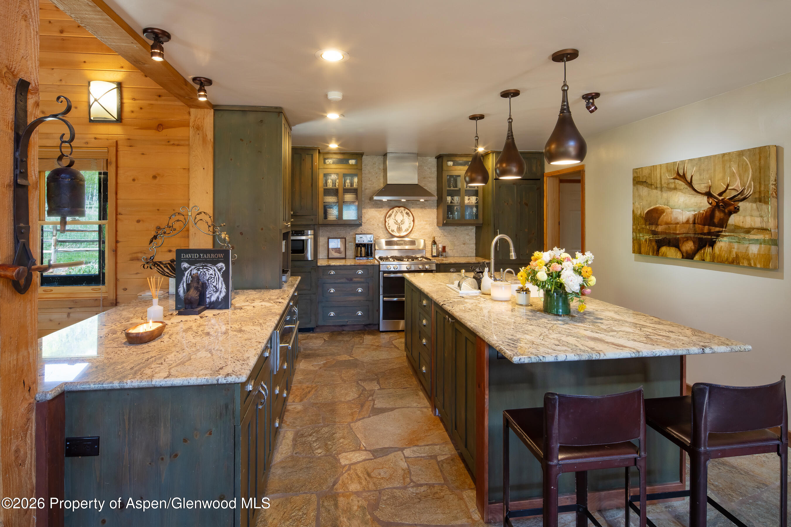294 Ruedi Creek Road Basalt, CO 81621 - Photo 11 of 27 a dining table with chairs and couches
