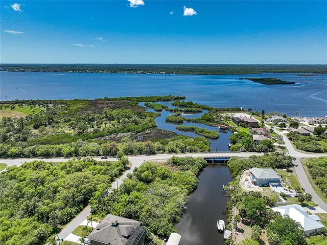 a view of a lake with a city