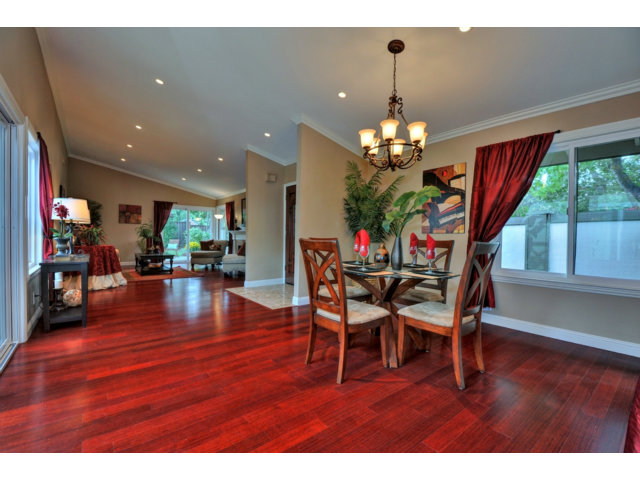 6182 Flowering Plum Road San Jose, CA 95120 - Photo 11 of 23 a dining room with furniture a chandelier and wooden floor