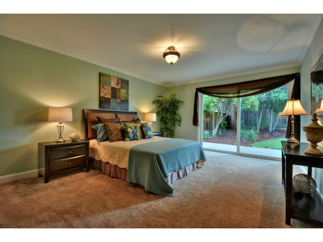 6182 Flowering Plum Road San Jose, CA 95120 - Photo 14 of 23 a bedroom with a bed and a large window