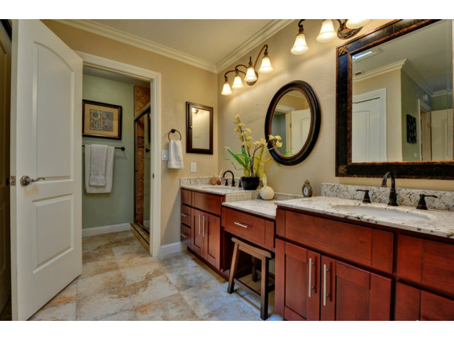 6182 Flowering Plum Road San Jose, CA 95120 - Photo 16 of 23 a bathroom with a double vanity sink and a mirror