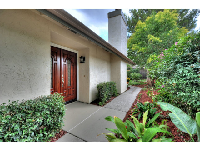 6182 Flowering Plum Road San Jose, CA 95120 - Photo 18 of 23 a view of a backyard with potted plants