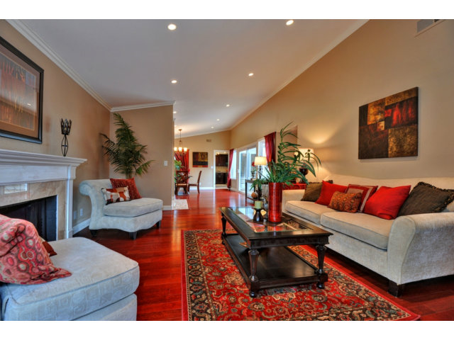 6182 Flowering Plum Road San Jose, CA 95120 - Photo 3 of 23 a living room with furniture and a fireplace