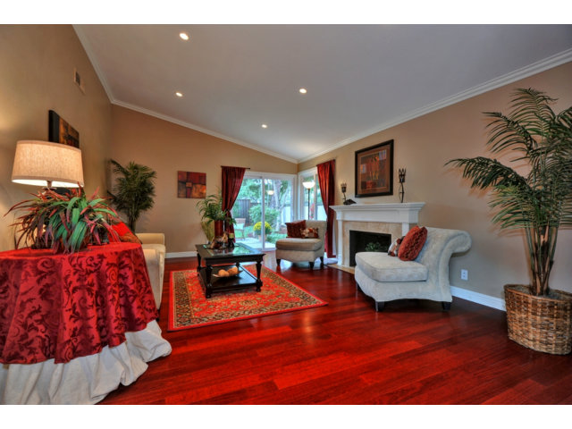 6182 Flowering Plum Road San Jose, CA 95120 - Photo 7 of 23 a living room with furniture and a fireplace