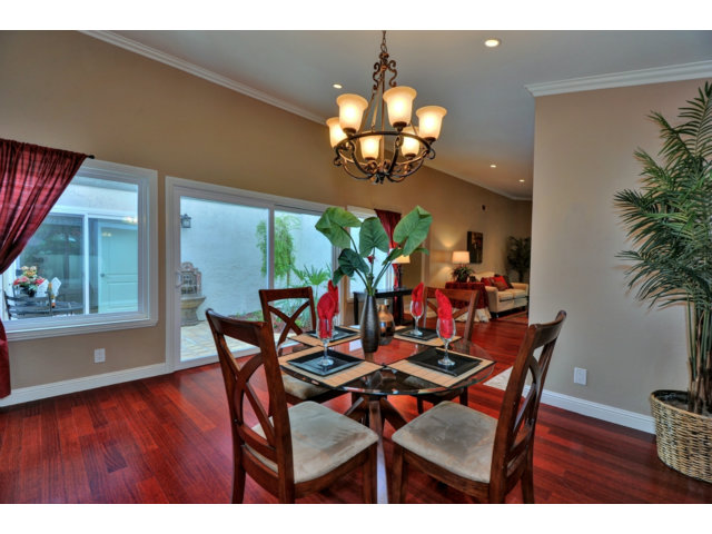 6182 Flowering Plum Road San Jose, CA 95120 - Photo 9 of 23 a view of a dining room with furniture and wooden floor