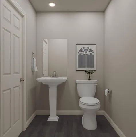 a bed sitting in a bedroom next to a window with lamp