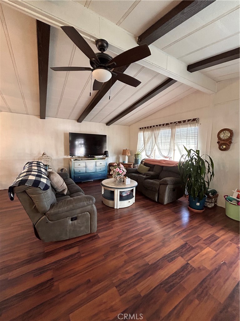 31816 Avenue E, Unit 135 Yucaipa, CA 92399 - Photo 2 of 12 a living room with furniture and wooden floor