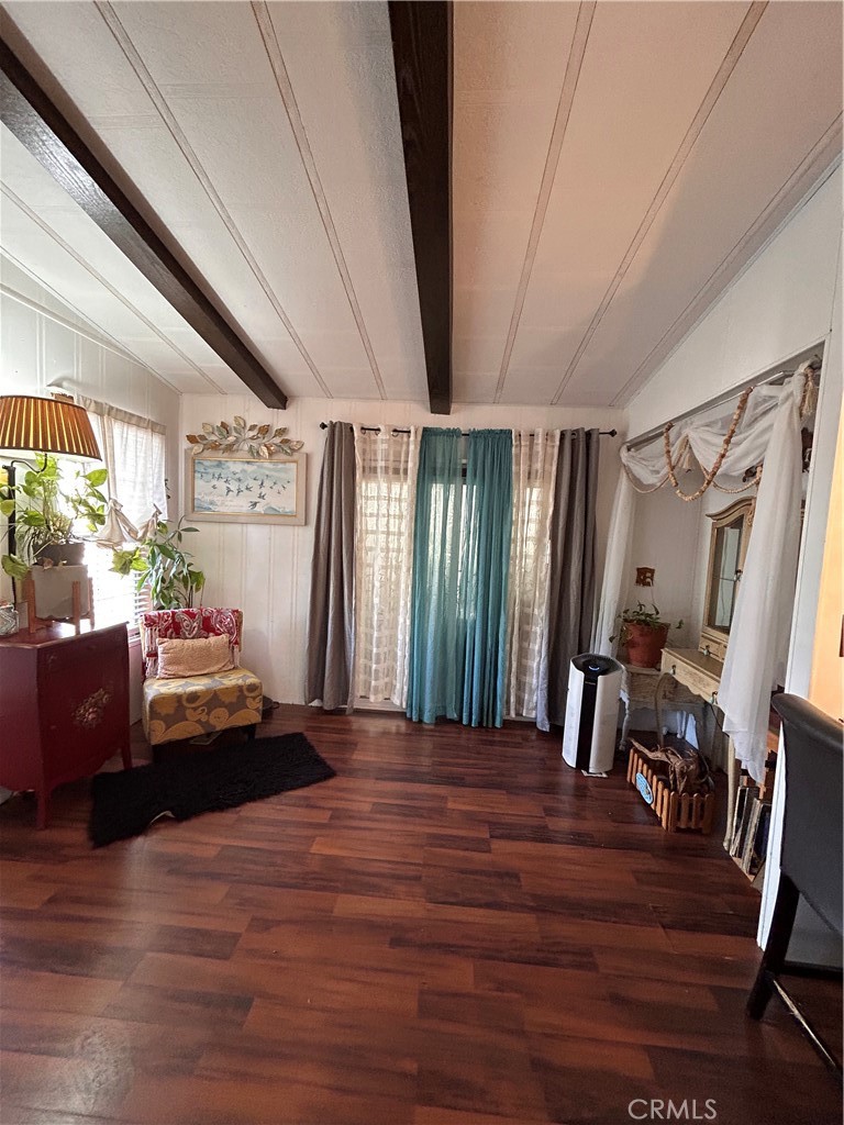 31816 Avenue E, Unit 135 Yucaipa, CA 92399 - Photo 3 of 12 a bedroom with furniture and a window