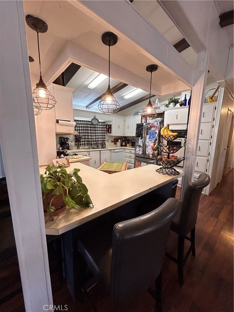 31816 Avenue E, Unit 135 Yucaipa, CA 92399 - Photo 5 of 12 a room with lots of appliances and cabinets