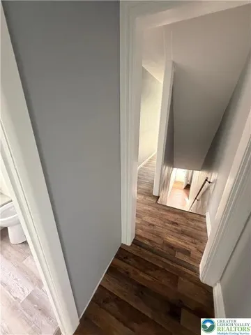 a bathroom with a sink a toilet and a bathtub