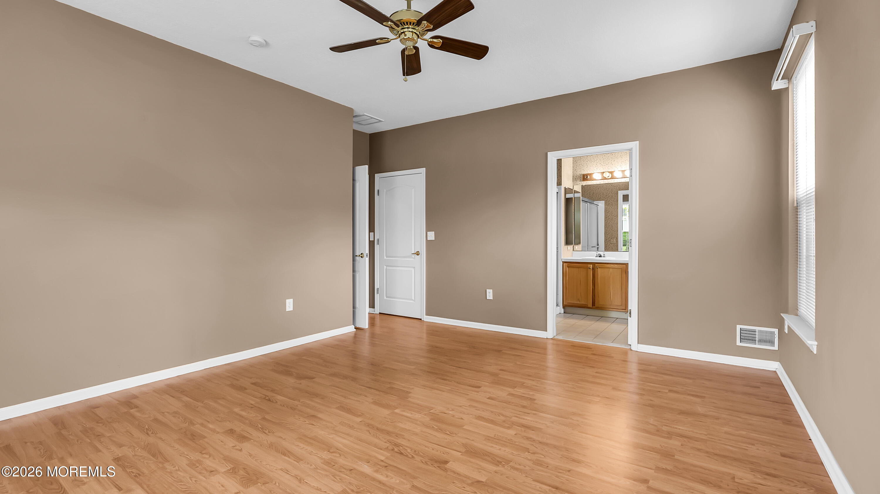 19 Silverside Road Lakewood, NJ 08701 - Photo 13 of 22 Primary view to bath and walk-in of left