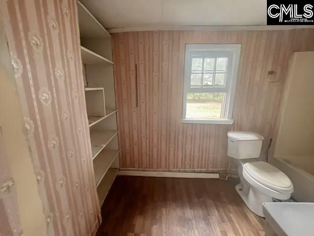 5545 Pisgah Road Rembert, SC 29128 - Photo 8 of 26 a bathroom with a toilet and a sink