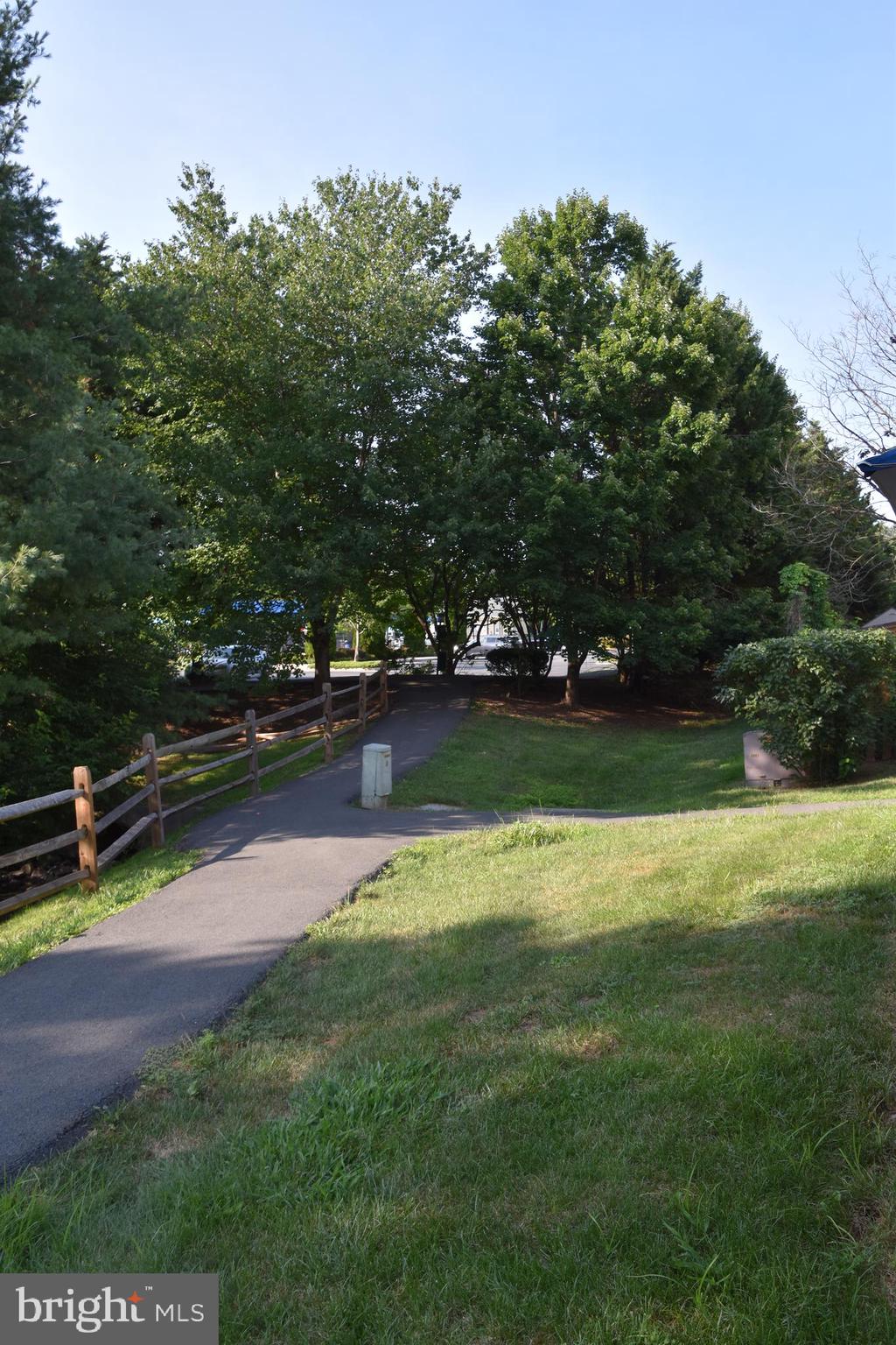 892 Smartts Lane Northeast Leesburg, VA 20176 - Photo 20 of 23 a view of a lake with houses