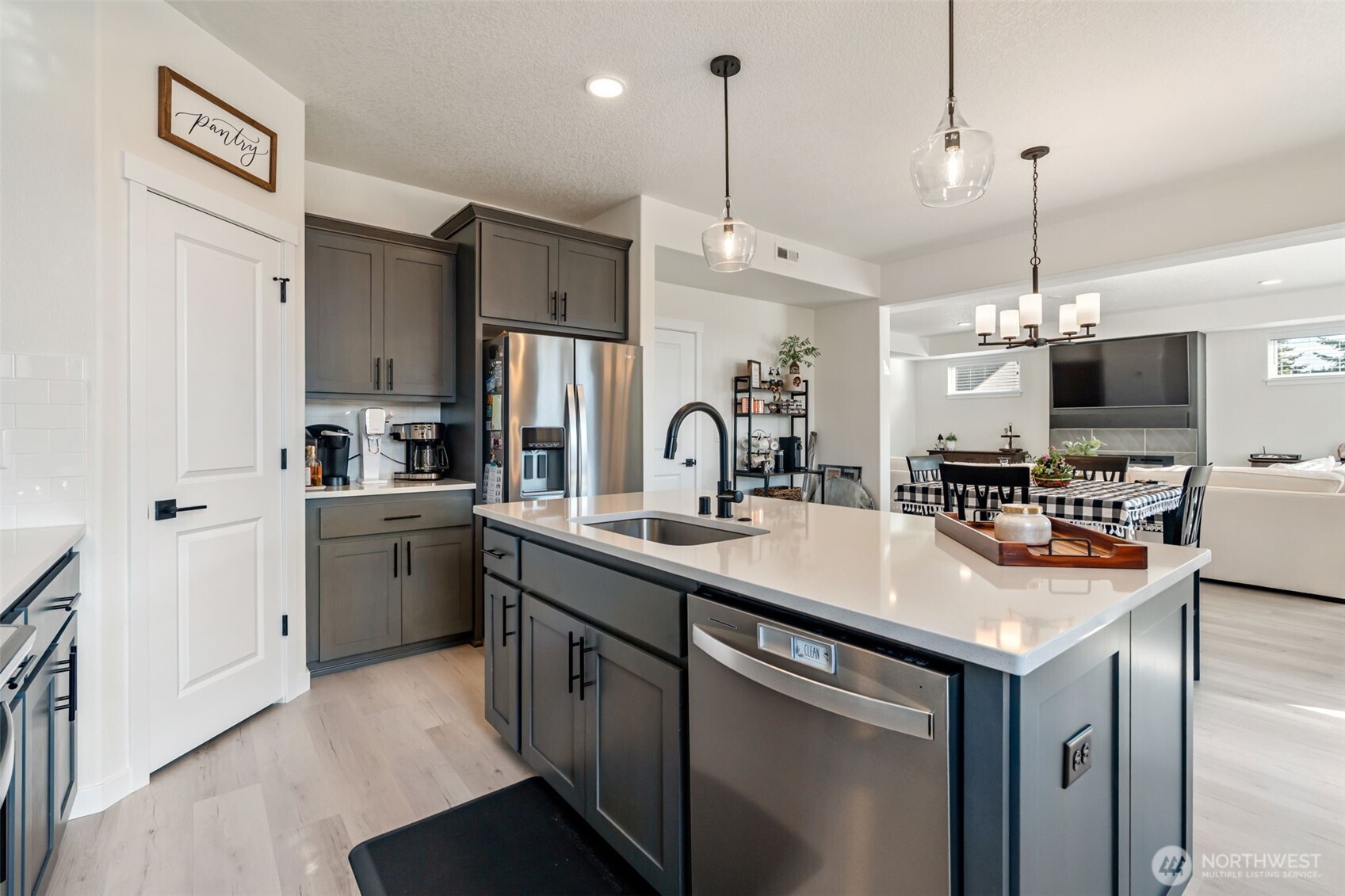 707 Cardinal Avenue Winlock, WA 98596 - Photo 16 of 36 a kitchen with kitchen island a sink stove and refrigerator