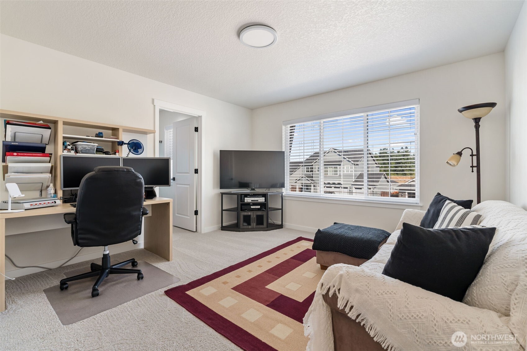 707 Cardinal Avenue Winlock, WA 98596 - Photo 23 of 36 a view of a livingroom with workspace and a window