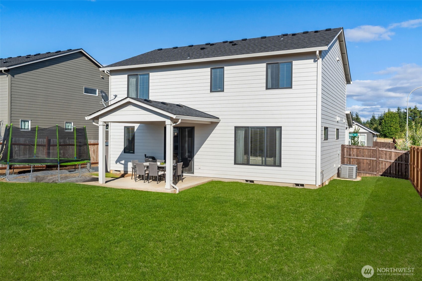 707 Cardinal Avenue Winlock, WA 98596 - Photo 29 of 36 a view of a house with a yard and sitting area