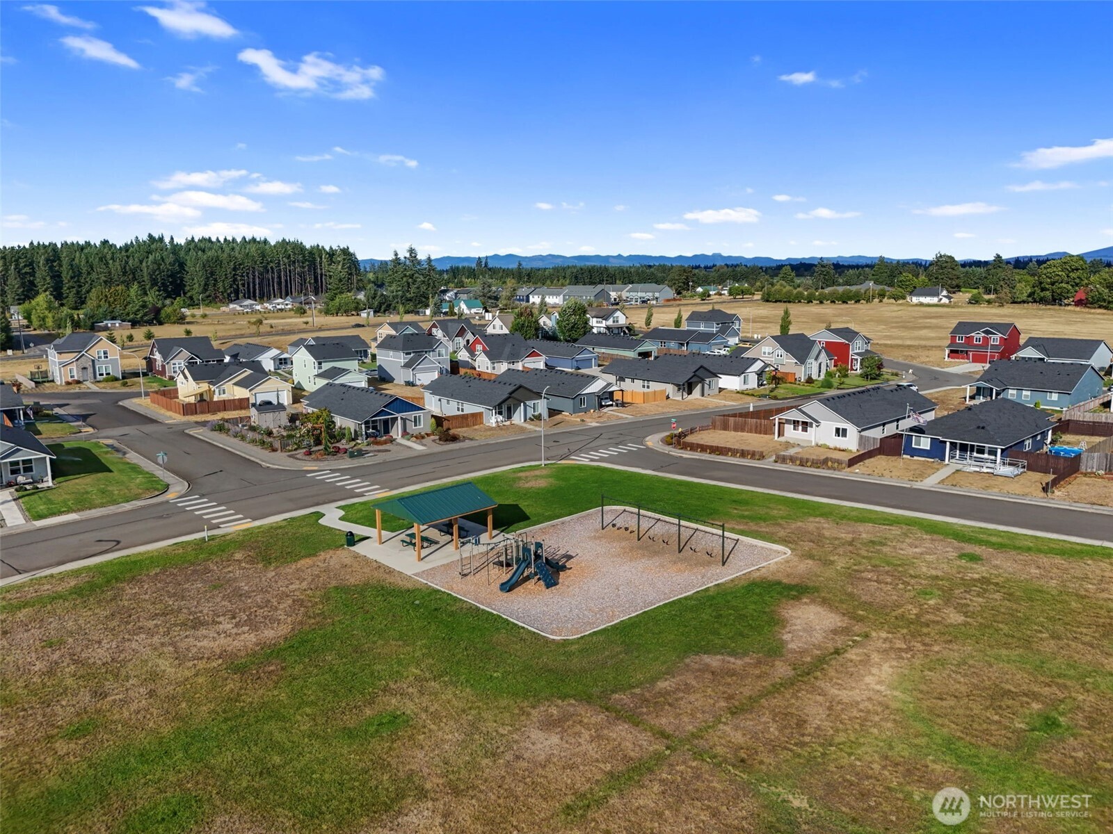 707 Cardinal Avenue Winlock, WA 98596 - Photo 32 of 36 an aerial view of a garden with lawn chairs
