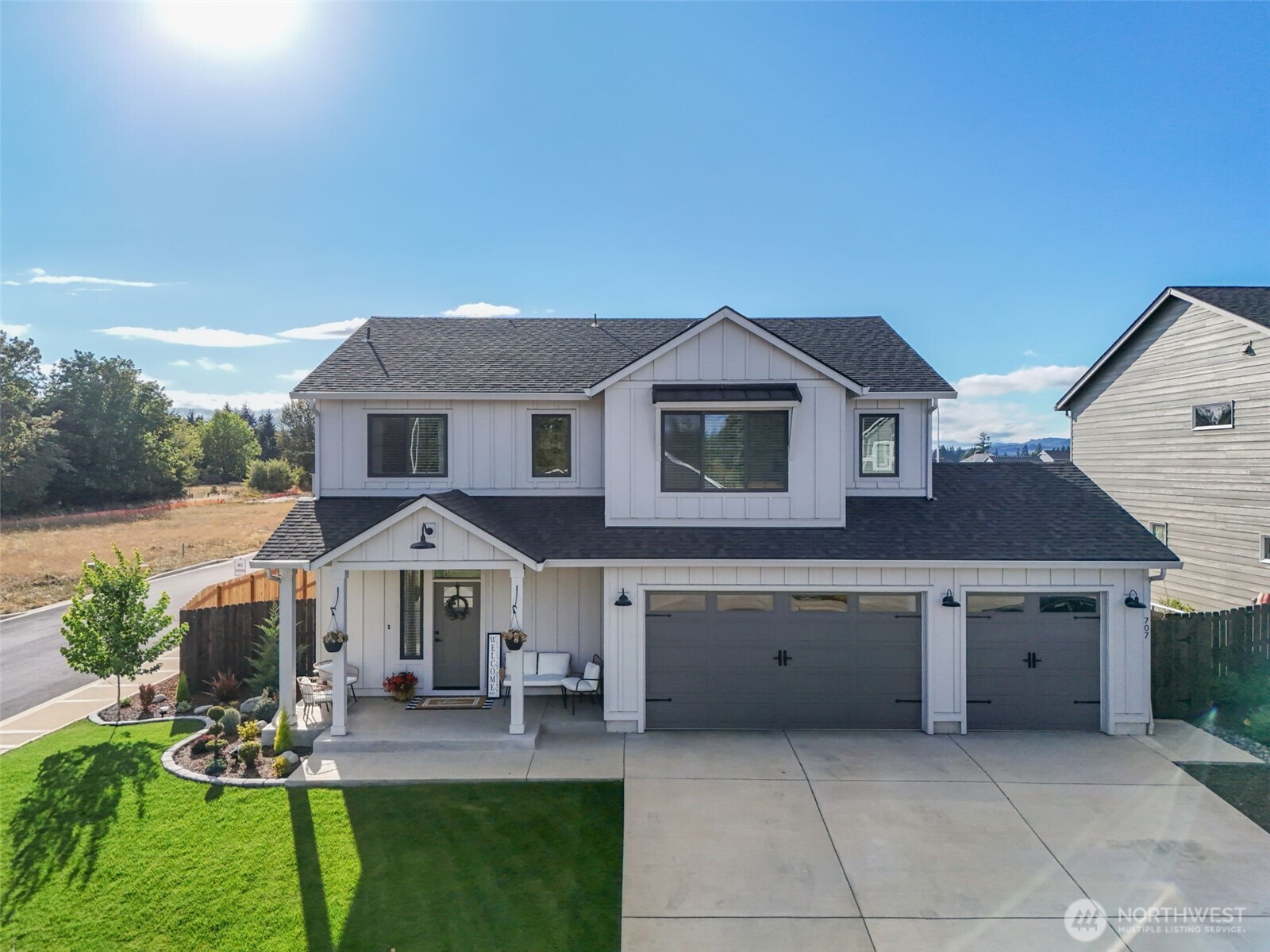 707 Cardinal Avenue Winlock, WA 98596 - Photo 33 of 36 a front view of house with yard and green space