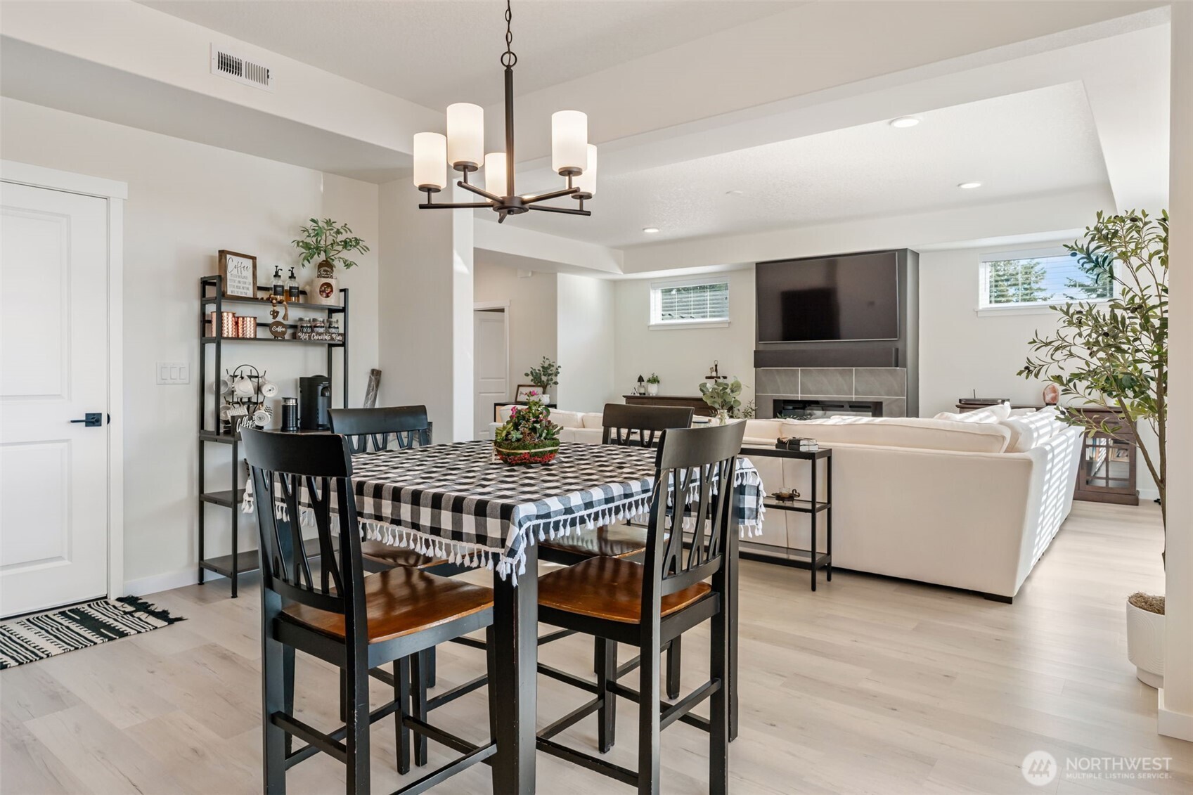 707 Cardinal Avenue Winlock, WA 98596 - Photo 10 of 36 a view of a dining room with furniture window and wooden floor