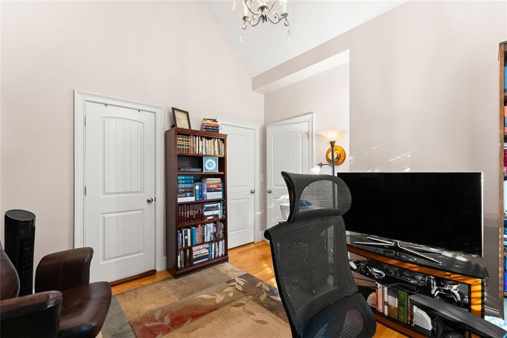 7269 Sloan Stephens Road Alto, GA 30510 - Photo 12 of 70 a living room with furniture and a flat screen tv