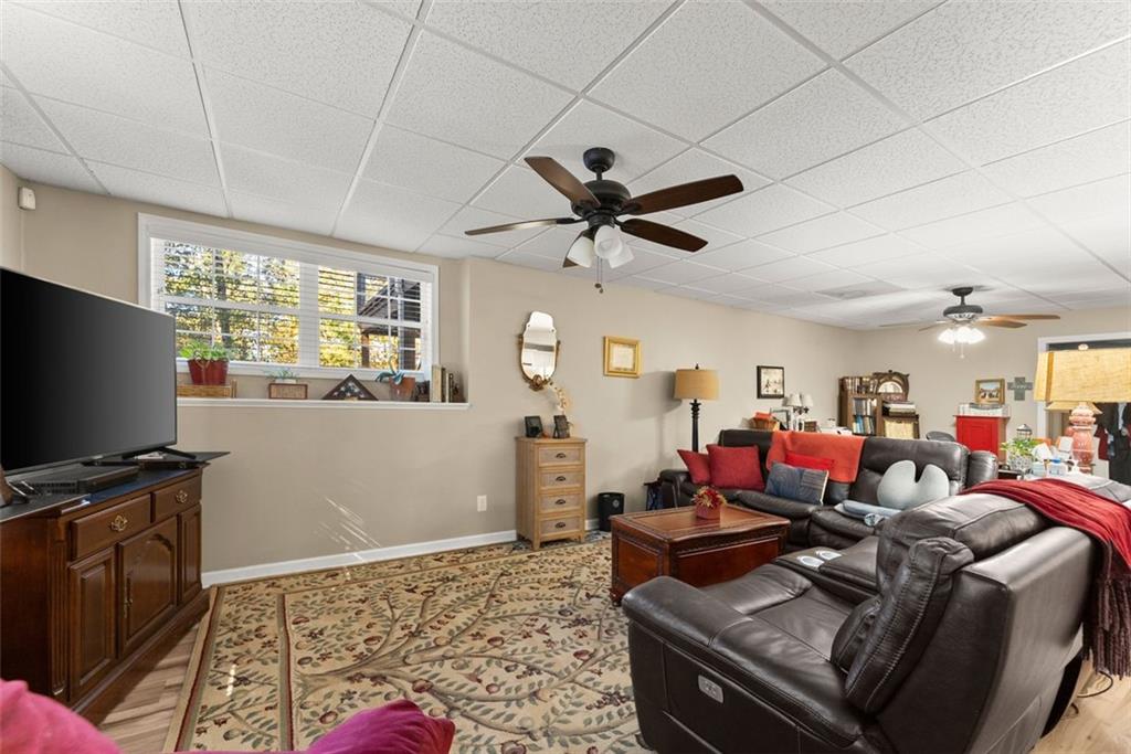7269 Sloan Stephens Road Alto, GA 30510 - Photo 40 of 70 a living room with furniture and a flat screen tv