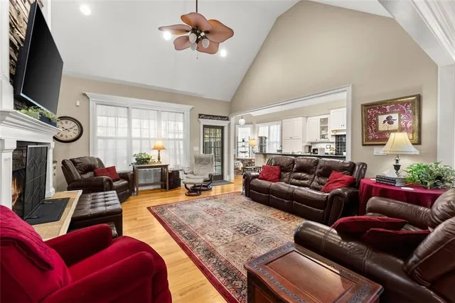 a bathroom with a granite countertop double vanity sink and a mirror