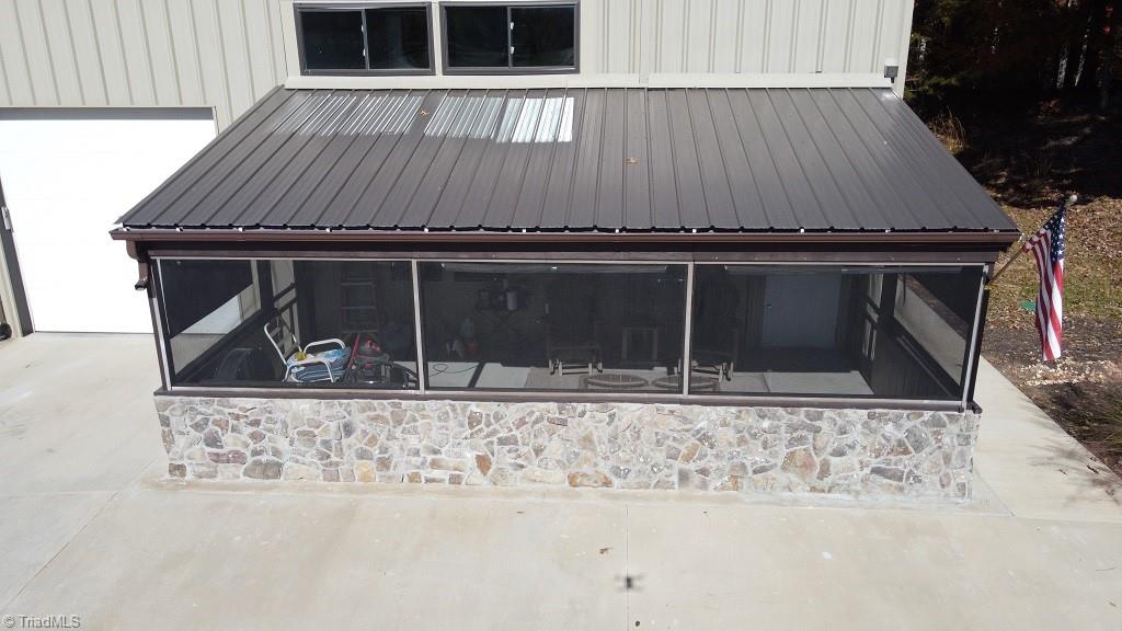 2040 Walshtown Road Boomer, NC 28606 - Photo 3 of 28 Large sunroom / sitting area.