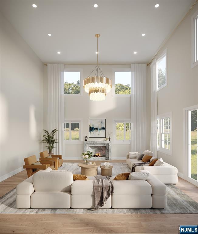 42 Werimus Road Woodcliff Lake, NJ 07677 - Photo 6 of 11 a living room with furniture or window and a chandelier