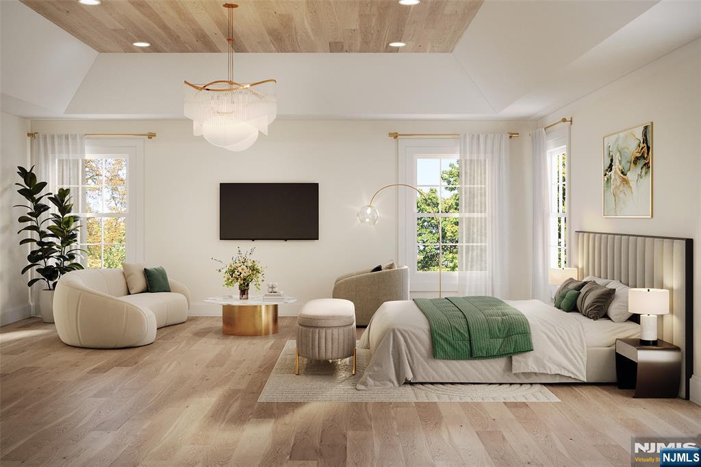 42 Werimus Road Woodcliff Lake, NJ 07677 - Photo 7 of 11 a bedroom with a bed mirror and couch