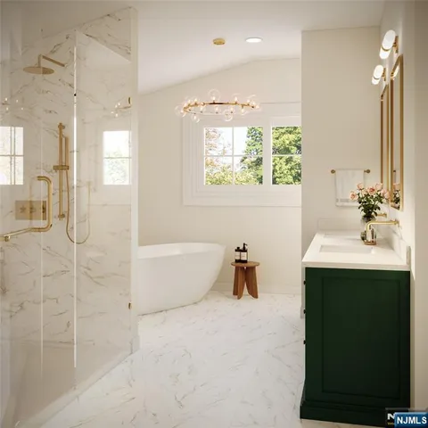 a bathroom with a bathtub sink and mirror
