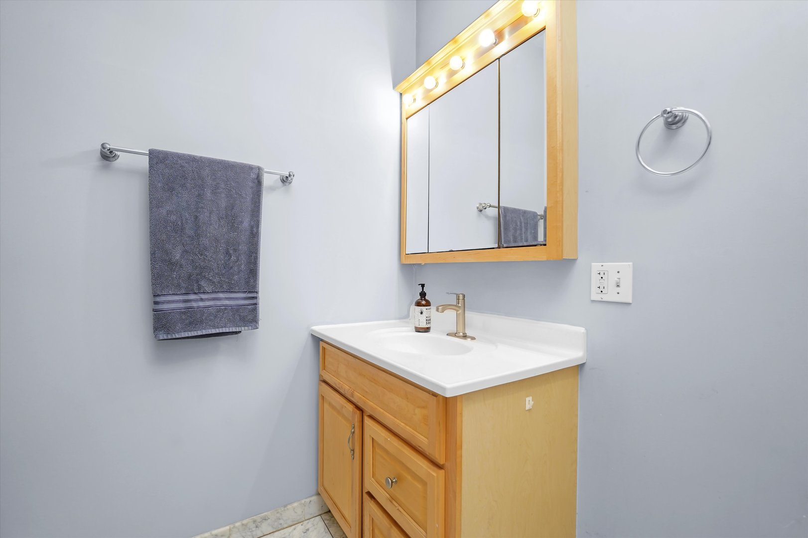 2744 West Haddon Avenue, Unit 2 Chicago, IL 60622 - Photo 15 of 22 a bathroom with a sink a vanity and mirror