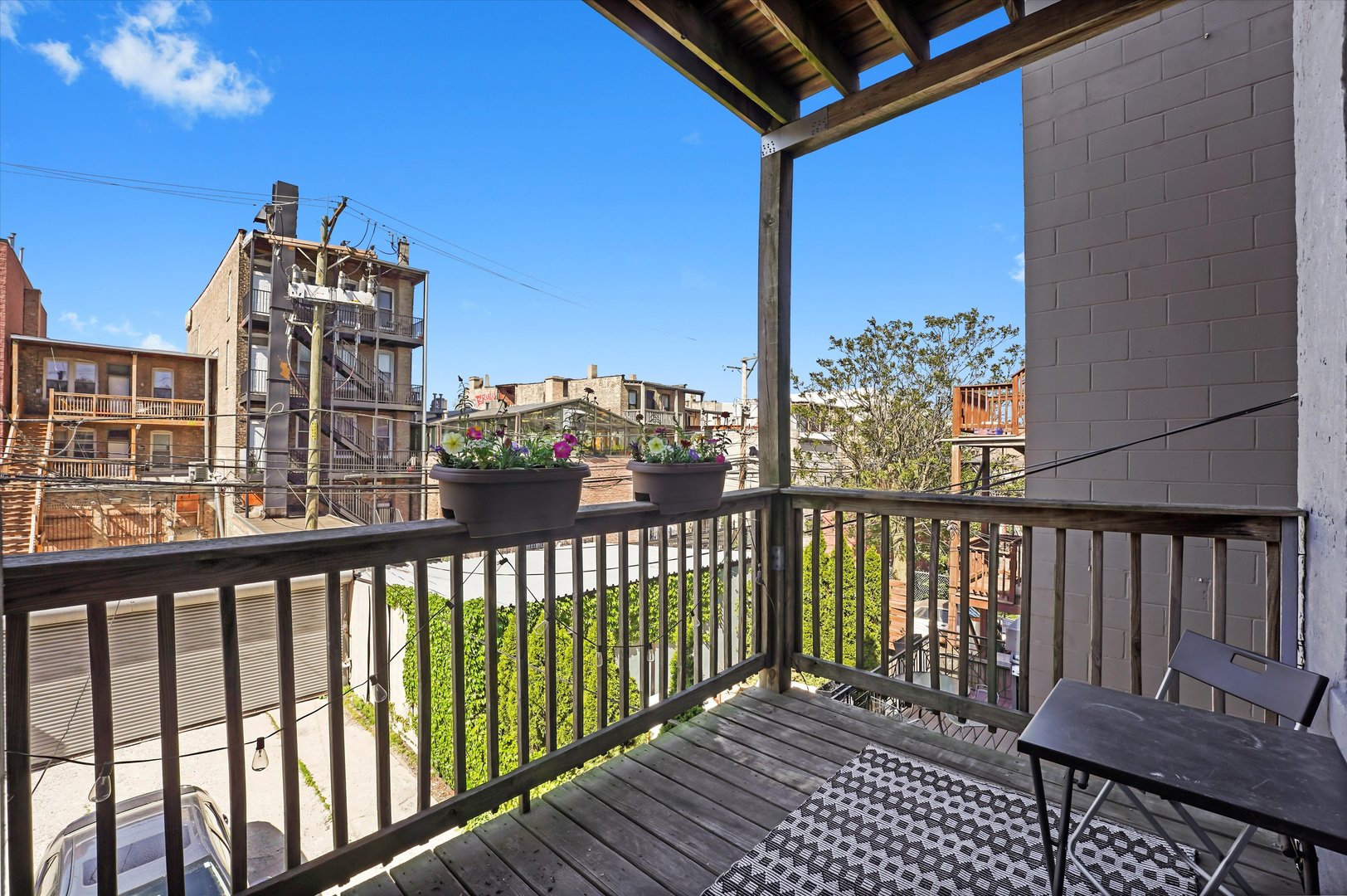 2744 West Haddon Avenue, Unit 2 Chicago, IL 60622 - Photo 17 of 22 a view of a balcony with wooden floor
