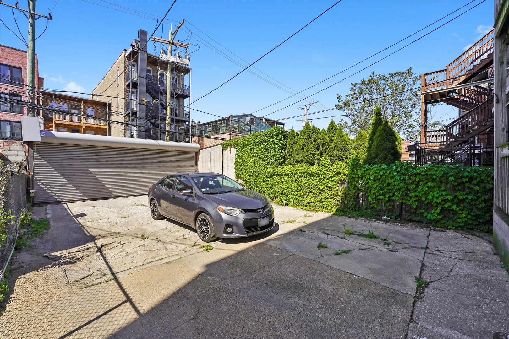 2744 West Haddon Avenue, Unit 2 Chicago, IL 60622 - Photo 18 of 22 a couple of flower plants in front of a house