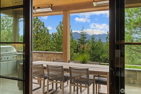 a view of a room with a large window