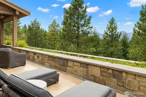a view of a two chair in the balcony