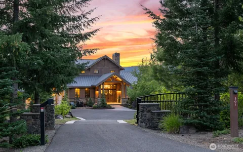 a view of a house with a street