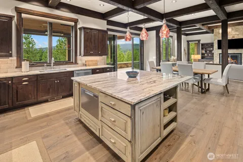 a kitchen with a stove and a sink