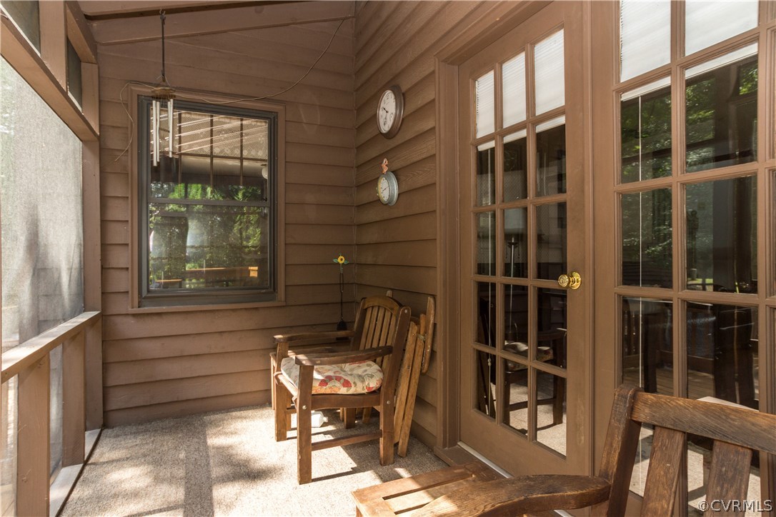 2901 Brookforest Road Midlothian, VA 23112 - Photo 24 of 29 a porch with a bench and chairs