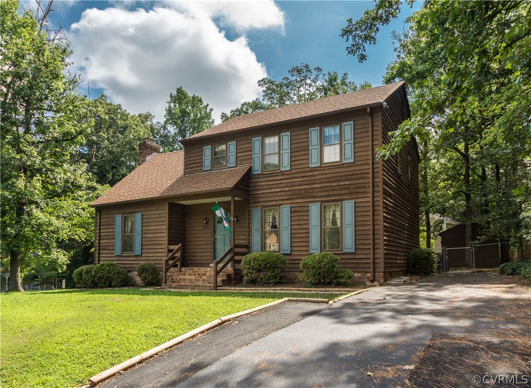2901 Brookforest Road Midlothian, VA 23112 - Photo 3 of 29 a front view of a house with a yard