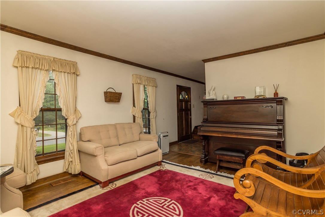 2901 Brookforest Road Midlothian, VA 23112 - Photo 6 of 29 a living room with furniture and a rug