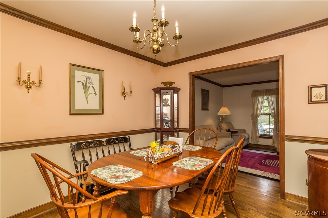2901 Brookforest Road Midlothian, VA 23112 - Photo 7 of 29 a view of a dining room with furniture and a chandelier