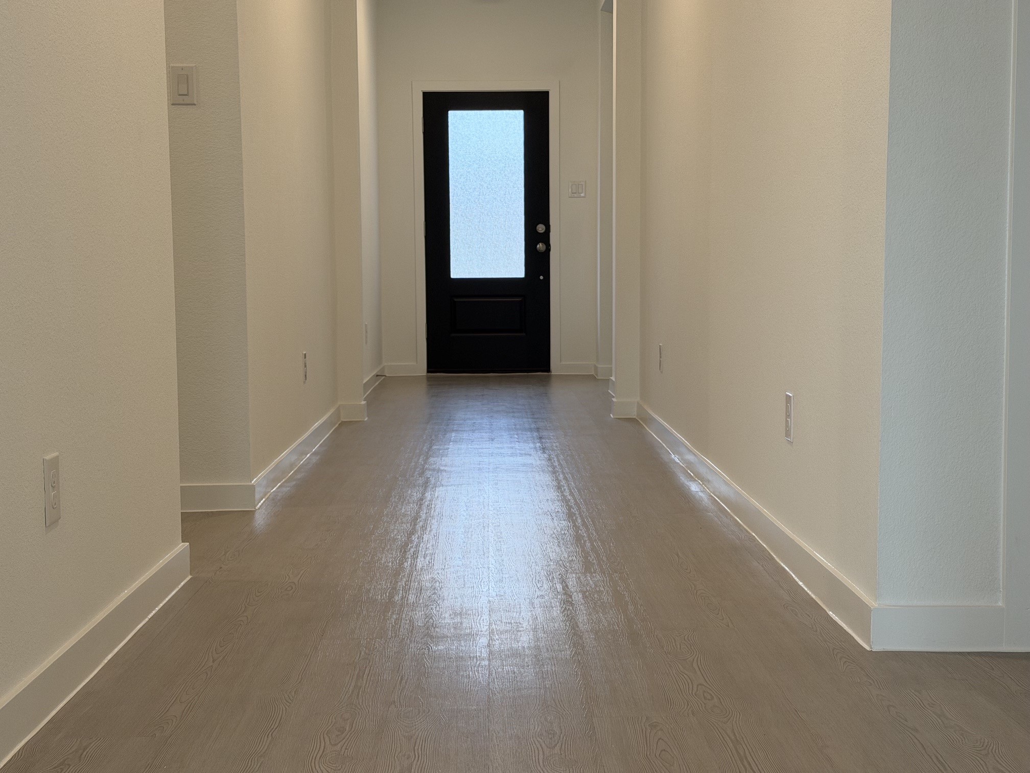 2514 Rose Gold Drive Rosharon, TX 77583 - Photo 4 of 27 a view of a hallway with wooden floor
